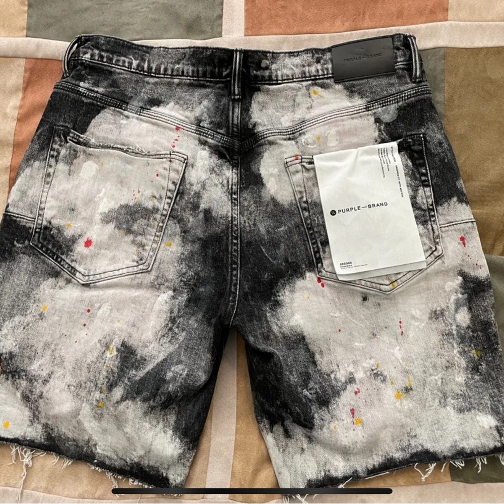 Purple Brand
style: P020 - cut off shorts,34, black bleached out paint splatter